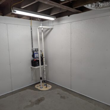Sump pump in basement Sump pump in basement