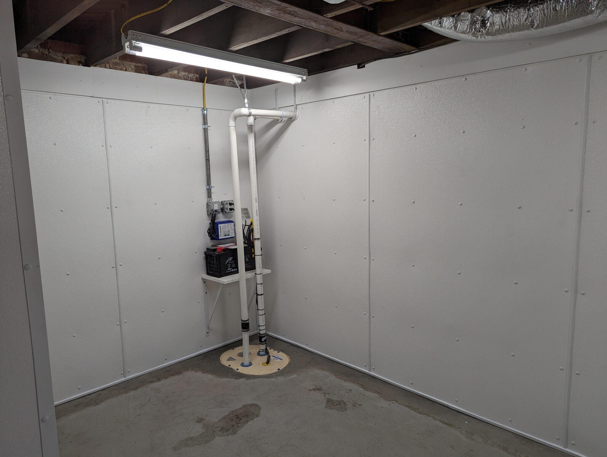 Sump pump in basement Sump pump in basement